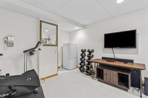 18 Juniper Ridge, Canmore, AB - Indoor Photo Showing Gym Room