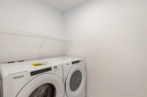 449 Hotchkiss Drive Se, Calgary, AB - Indoor Photo Showing Laundry Room