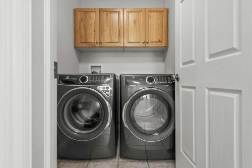 4702 21 Street Sw, Calgary, AB - Indoor Photo Showing Laundry Room