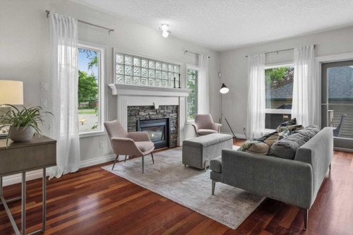 4702 21 Street Sw, Calgary, AB - Indoor Photo Showing Living Room With Fireplace