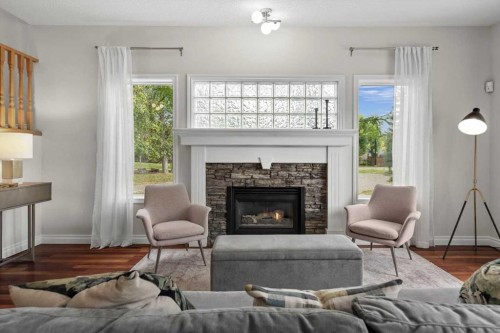 4702 21 Street Sw, Calgary, AB - Indoor Photo Showing Living Room With Fireplace