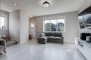 104 Red Embers Manor Ne, Calgary, AB  - Indoor Photo Showing Living Room 