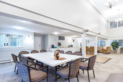 136-5000 Somervale Court Sw, Calgary, AB - Indoor Photo Showing Dining Room