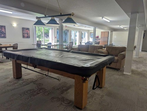 136-5000 Somervale Court Sw, Calgary, AB - Indoor Photo Showing Other Room