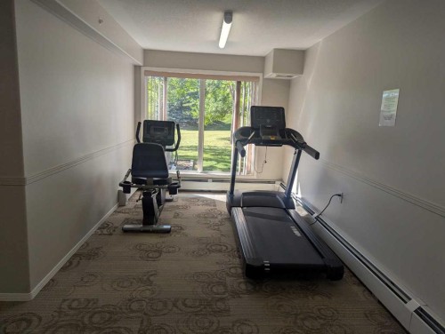 136-5000 Somervale Court Sw, Calgary, AB - Indoor Photo Showing Gym Room