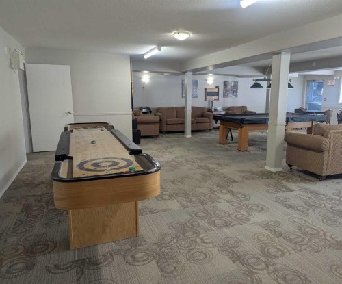 136-5000 Somervale Court Sw, Calgary, AB - Indoor Photo Showing Other Room