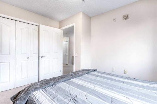 136-5000 Somervale Court Sw, Calgary, AB - Indoor Photo Showing Bedroom