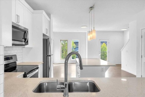 417 Legacy Boulevard Se, Calgary, AB - Indoor Photo Showing Kitchen With Stainless Steel Kitchen With Double Sink With Upgraded Kitchen