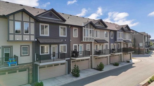 417 Legacy Boulevard Se, Calgary, AB - Outdoor With Balcony With Facade