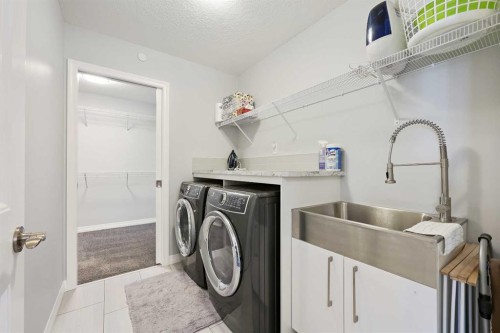 69 Howse Mount Ne, Calgary, AB - Indoor Photo Showing Laundry Room