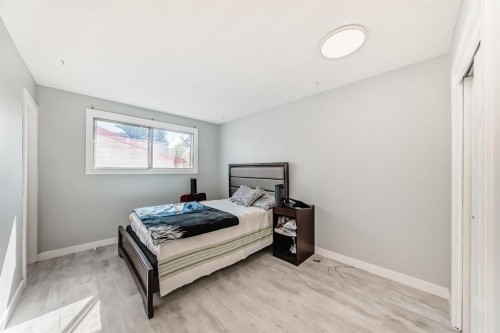 948 Rundlecairn Way Ne, Calgary, AB - Indoor Photo Showing Bedroom