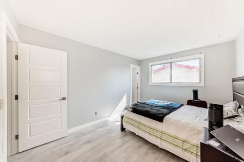 948 Rundlecairn Way Ne, Calgary, AB - Indoor Photo Showing Bedroom
