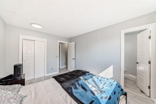 948 Rundlecairn Way Ne, Calgary, AB - Indoor Photo Showing Bedroom