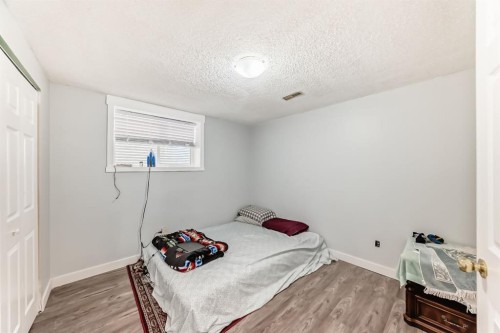 948 Rundlecairn Way Ne, Calgary, AB - Indoor Photo Showing Bedroom