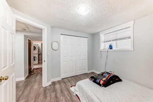 948 Rundlecairn Way Ne, Calgary, AB - Indoor Photo Showing Bedroom