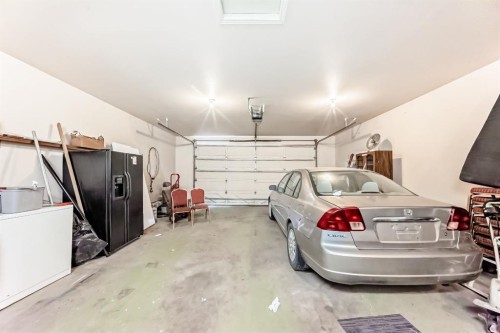 948 Rundlecairn Way Ne, Calgary, AB - Indoor Photo Showing Garage