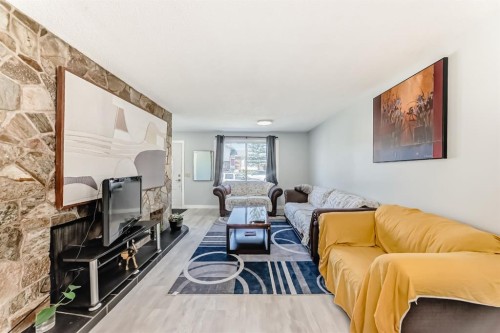 948 Rundlecairn Way Ne, Calgary, AB - Indoor Photo Showing Living Room