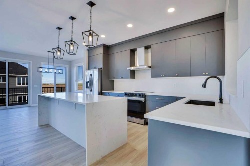 305 Lucas Place Nw, Calgary, AB - Indoor Photo Showing Kitchen With Stainless Steel Kitchen With Upgraded Kitchen