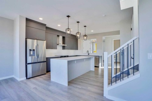 305 Lucas Place Nw, Calgary, AB - Indoor Photo Showing Kitchen With Stainless Steel Kitchen With Upgraded Kitchen