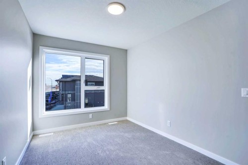 305 Lucas Place Nw, Calgary, AB - Indoor Photo Showing Other Room