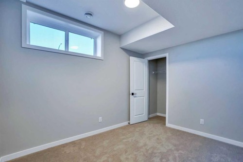 305 Lucas Place Nw, Calgary, AB - Indoor Photo Showing Other Room