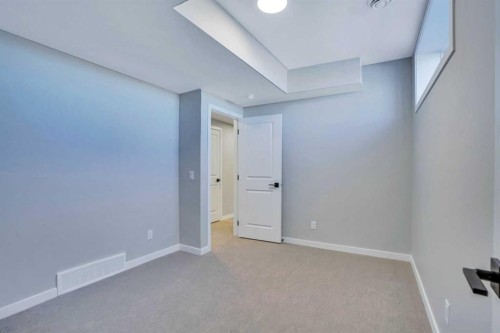 305 Lucas Place Nw, Calgary, AB - Indoor Photo Showing Other Room