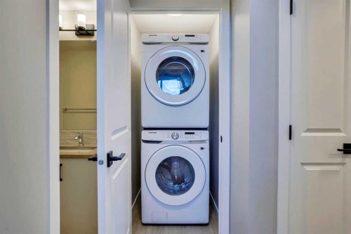 305 Lucas Place Nw, Calgary, AB - Indoor Photo Showing Laundry Room