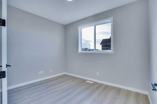 305 Lucas Place Nw, Calgary, AB - Indoor Photo Showing Other Room