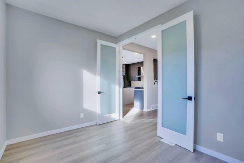 305 Lucas Place Nw, Calgary, AB - Indoor Photo Showing Other Room