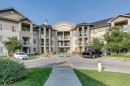 2205-2518 Fish Creek Boulevard Sw, Calgary, AB  - Outdoor With Balcony With Facade 