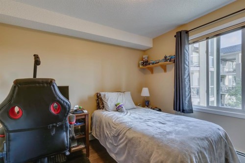 2205-2518 Fish Creek Boulevard Sw, Calgary, AB - Indoor Photo Showing Bedroom