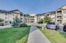 2205-2518 Fish Creek Boulevard Sw, Calgary, AB  - Outdoor With Balcony With Facade 