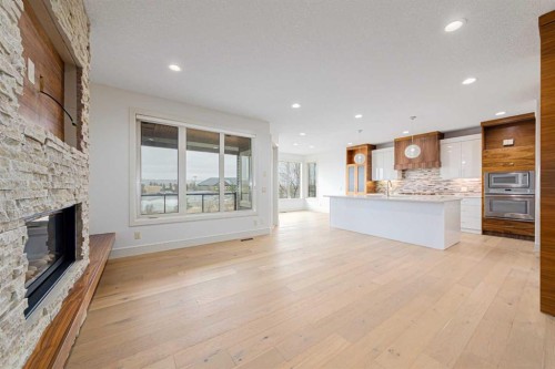74 Chaparral Valley Square Se, Calgary, AB - Indoor Photo Showing Kitchen With Fireplace With Upgraded Kitchen