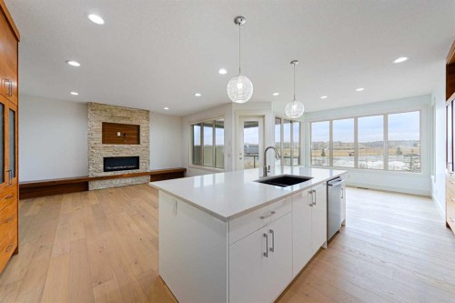 74 Chaparral Valley Square Se, Calgary, AB - Indoor Photo Showing Kitchen With Fireplace With Upgraded Kitchen