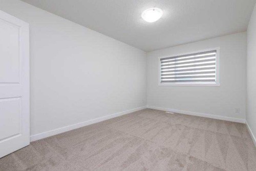 33 Walcrest Lane Se, Calgary, AB - Indoor Photo Showing Other Room