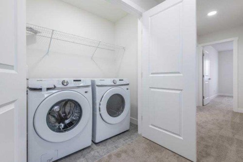 33 Walcrest Lane Se, Calgary, AB - Indoor Photo Showing Laundry Room