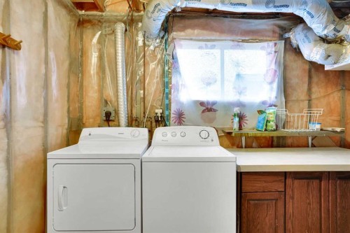 63 Knight Place, Crossfield, AB - Indoor Photo Showing Laundry Room