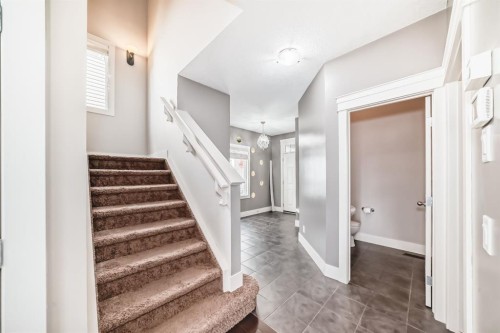 14 Heritage View, Cochrane, AB - Indoor Photo Showing Other Room