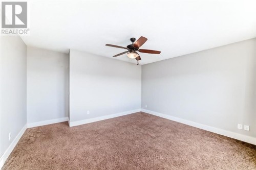 14 Heritage View, Cochrane, AB - Indoor Photo Showing Other Room
