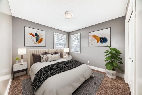 14 Heritage View, Cochrane, AB - Indoor Photo Showing Bedroom