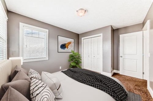 14 Heritage View, Cochrane, AB - Indoor Photo Showing Bedroom
