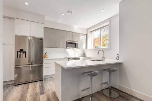 27 Hendon Place Nw, Calgary, AB - Indoor Photo Showing Kitchen With Stainless Steel Kitchen With Upgraded Kitchen