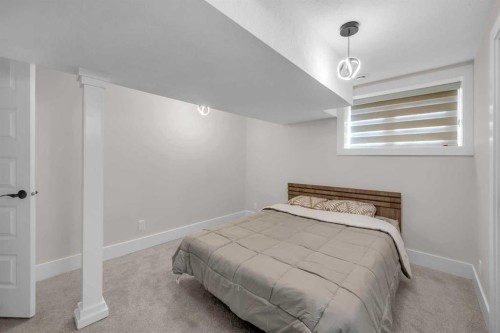 9819 2 Street Se, Calgary, AB - Indoor Photo Showing Bedroom