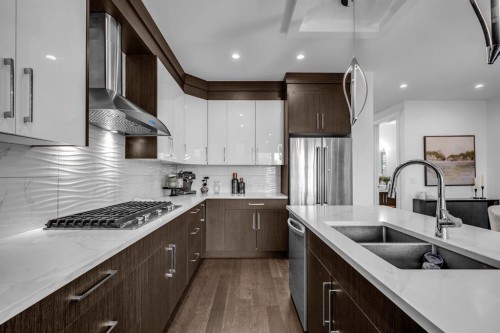2640 28 Street Sw, Calgary, AB - Indoor Photo Showing Kitchen With Stainless Steel Kitchen With Double Sink With Upgraded Kitchen