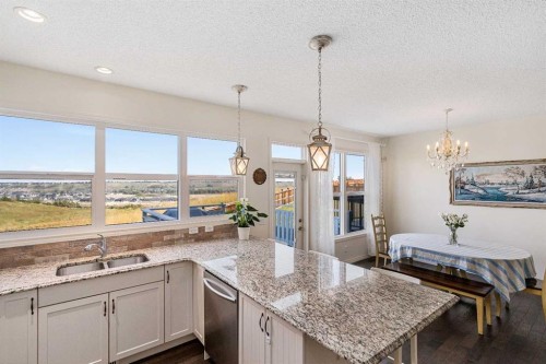 135 Legacy Reach Manor Se, Calgary, AB - Indoor Photo Showing Kitchen With Double Sink With Upgraded Kitchen