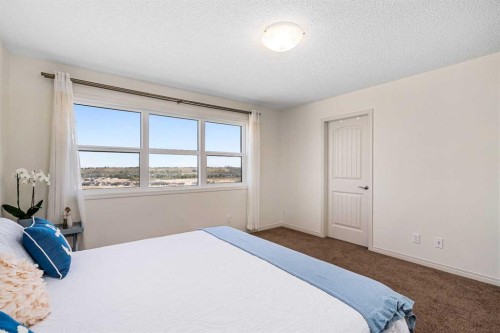 135 Legacy Reach Manor Se, Calgary, AB - Indoor Photo Showing Bedroom
