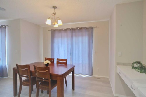 133 Panamount Court Nw, Calgary, AB - Indoor Photo Showing Dining Room