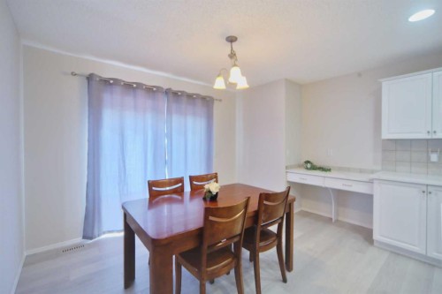 133 Panamount Court Nw, Calgary, AB - Indoor Photo Showing Dining Room