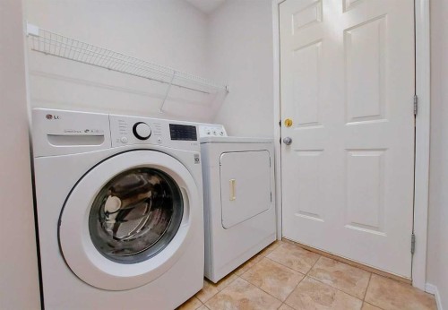 133 Panamount Court Nw, Calgary, AB - Indoor Photo Showing Laundry Room