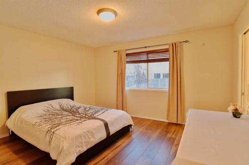 133 Panamount Court Nw, Calgary, AB - Indoor Photo Showing Bedroom